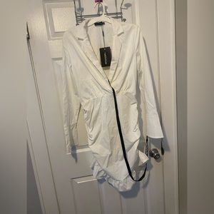 White, tight fitted, low neck dress